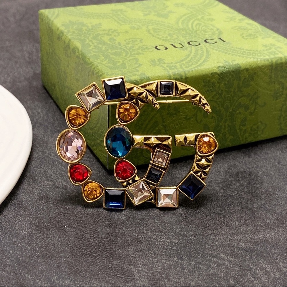 Gucci brooches